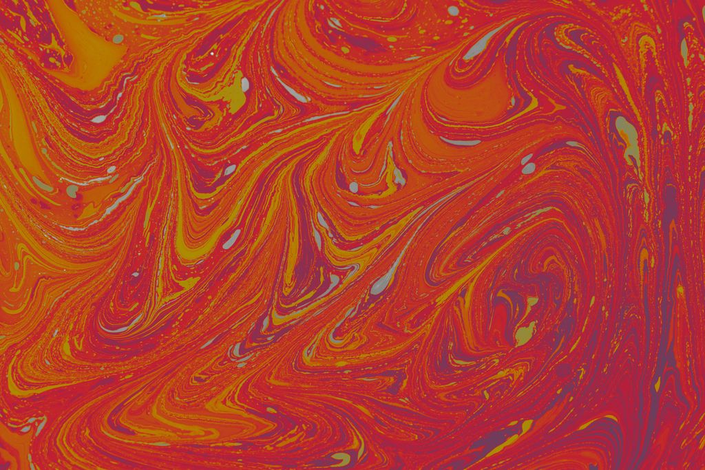 Dynamic abstract fluid painting with lively red and orange swirls in acrylic art design.